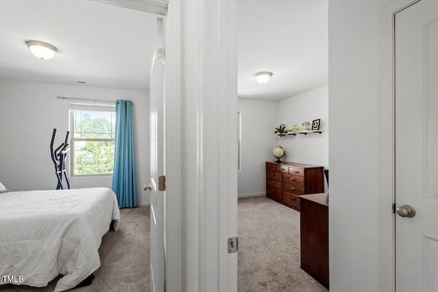 534 Hobkirks Pl, Durham, NC 27704 - bedroom with light carpet and baseboards
