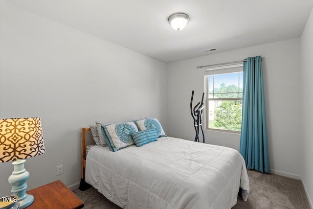 534 Hobkirks Pl, Durham, NC 27704 - bedroom with carpet flooring and baseboards