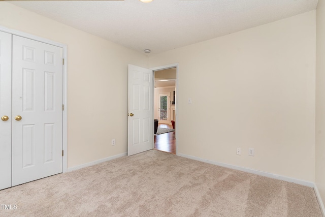 432 Barn View Ct, Fuquay Varina, NC 27526 - unfurnished bedroom featuring carpet floors and baseboards