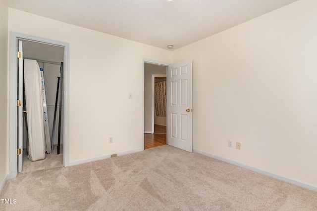 432 Barn View Ct, Fuquay Varina, NC 27526 - unfurnished bedroom with carpet flooring and baseboards