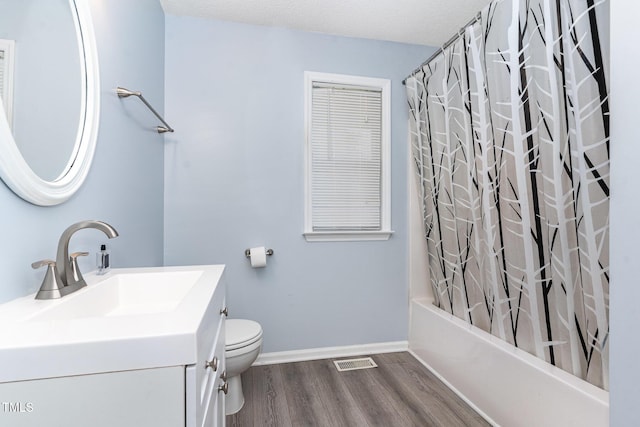 432 Barn View Ct, Fuquay Varina, NC 27526 - bathroom featuring vanity, wood finished floors, and shower / tub combo