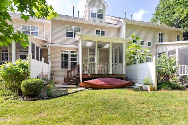 204 Towne Ridge Ln, Chapel Hill, NC 27516 - back of property with a sunroom and ceiling fan