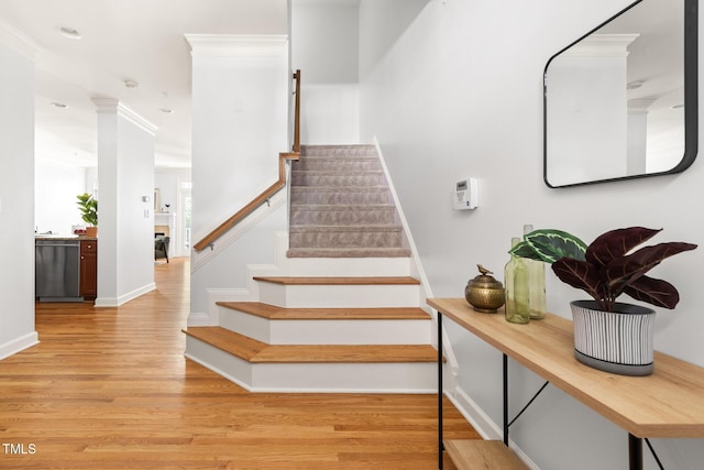 204 Towne Ridge Ln, Chapel Hill, NC 27516 - staircase with wood finished floors, ornamental molding, and recessed lighting