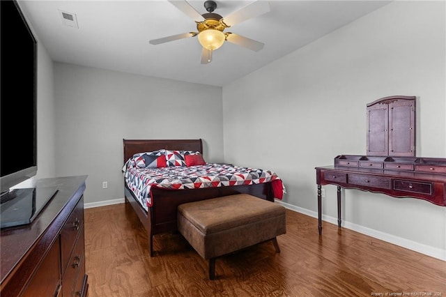 1921 Yellowbrick Rd, Fayetteville, NC 28314 - bedroom with dark wood finished floors and a ceiling fan