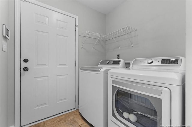 1921 Yellowbrick Rd, Fayetteville, NC 28314 - laundry room with washer and clothes dryer
