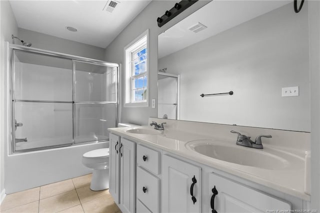 1921 Yellowbrick Rd, Fayetteville, NC 28314 - full bath featuring double vanity, bath / shower combo with glass door, and tile patterned flooring