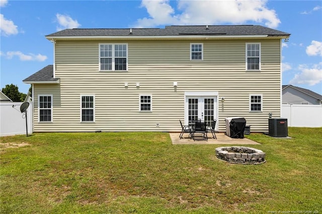 1921 Yellowbrick Rd, Fayetteville, NC 28314 - rear view of house with an outdoor fire pit, a patio, and french doors