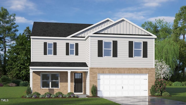 170 Babbling Creek Dr, Youngsville, NC 27596 - view of front of property with brick siding, driveway, a front yard, board and batten siding, and a garage