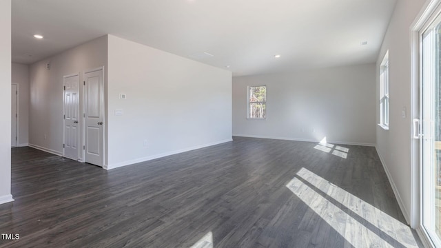 170 Babbling Creek Dr, Youngsville, NC 27596 - spare room with dark wood-type flooring and recessed lighting