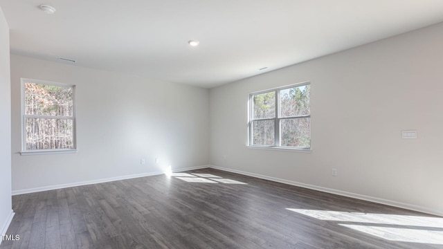 170 Babbling Creek Dr, Youngsville, NC 27596 - unfurnished room with dark wood finished floors and a smoke detector