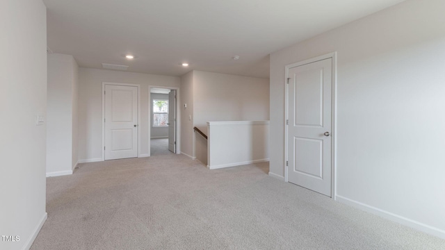 170 Babbling Creek Dr, Youngsville, NC 27596 - unfurnished room with light colored carpet and recessed lighting