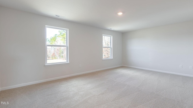 170 Babbling Creek Dr, Youngsville, NC 27596 - spare room with light colored carpet and recessed lighting