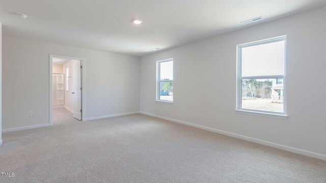 170 Babbling Creek Dr, Youngsville, NC 27596 - unfurnished room featuring light colored carpet and a smoke detector