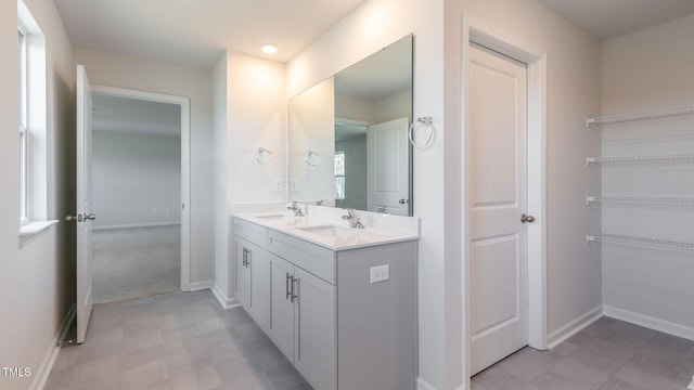 170 Babbling Creek Dr, Youngsville, NC 27596 - full bath with double vanity and tile patterned floors