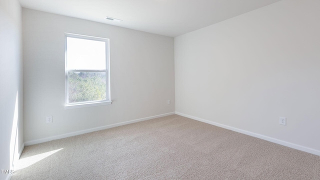 170 Babbling Creek Dr, Youngsville, NC 27596 - carpeted spare room with baseboards