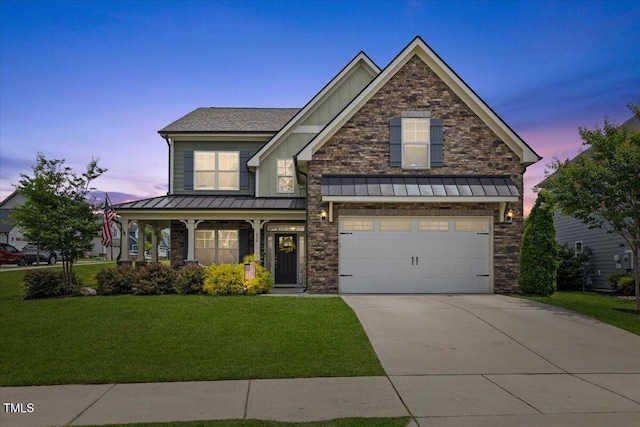 824 Stanly House St, Wake Forest, NC 27587 - craftsman-style house with board and batten siding, a front lawn, driveway, and a standing seam roof