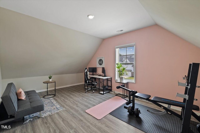 824 Stanly House St, Wake Forest, NC 27587 - workout area featuring wood finished floors and lofted ceiling