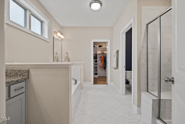 824 Stanly House St, Wake Forest, NC 27587 - full bath with a garden tub, vanity, a shower stall, and a walk in closet