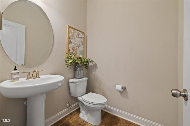 824 Stanly House St, Wake Forest, NC 27587 - half bath with baseboards and wood finished floors
