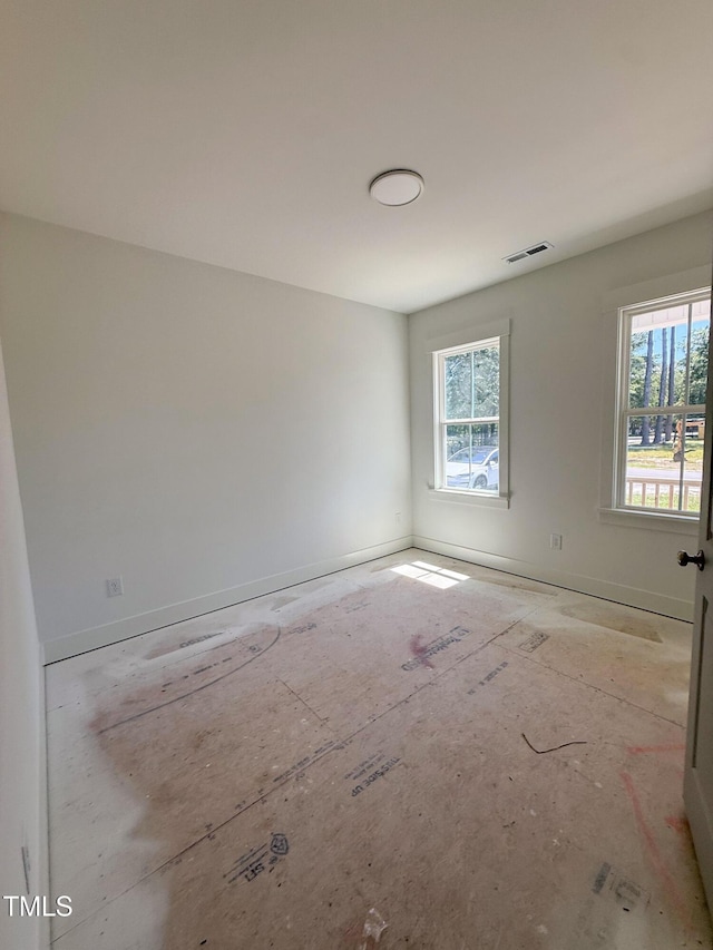 213 Maye St, Dunn, NC 28334 - spare room with baseboards
