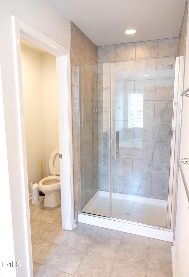 1402 Southpoint Trl, Durham, NC 27713 - full bath featuring a stall shower, tile patterned flooring, and recessed lighting