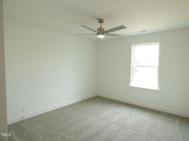 5610 Plain View Highway, Dunn, NC 28334 - spare room with light colored carpet and a ceiling fan