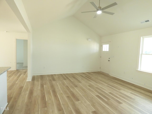 5610 Plain View Highway, Dunn, NC 28334 - empty room featuring ceiling fan, light wood-style flooring, and vaulted ceiling