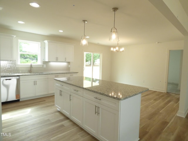 5610 Plain View Highway, Dunn, NC 28334 - kitchen featuring stainless steel dishwasher, plenty of natural light, light wood finished floors, backsplash, and recessed lighting