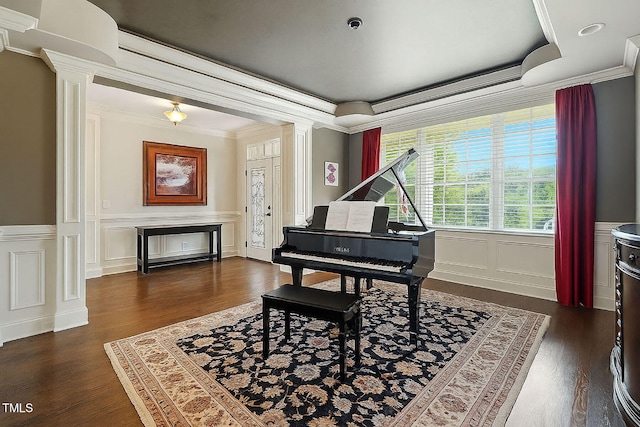 164 Avocet Ln, Clayton, NC 27520 - sitting room featuring ornate columns, a decorative wall, crown molding, dark wood-type flooring, and wainscoting