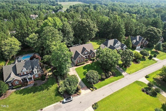 164 Avocet Ln, Clayton, NC 27520 - aerial perspective of suburban area with a forest