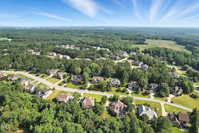 164 Avocet Ln, Clayton, NC 27520 - aerial perspective of suburban area featuring a forest