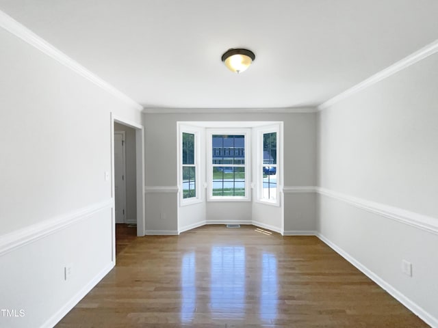 17 Ballard Ct, Durham, NC 27712 - empty room with crown molding and wood finished floors