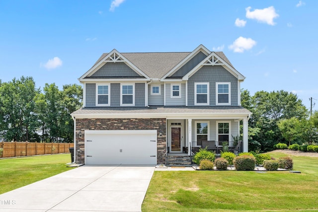 1321 White Spruce Dr, Willow Springs, NC 27592 - craftsman inspired home with covered porch, concrete driveway, a garage, and a shingled roof