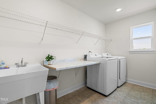 1321 White Spruce Dr, Willow Springs, NC 27592 - laundry room with washing machine and clothes dryer and baseboards