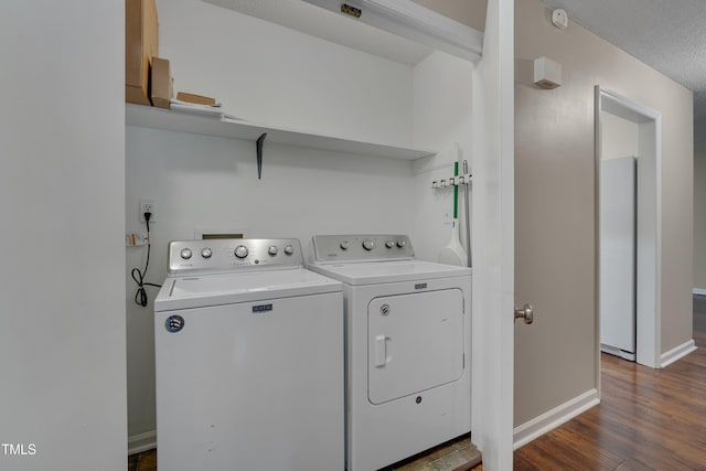 4140 Willow Haven Ct, Raleigh, NC 27616 - laundry area featuring independent washer and dryer and wood finished floors