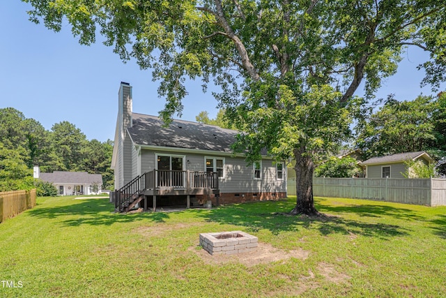 4140 Willow Haven Ct, Raleigh, NC 27616 - rear view of house featuring a deck, a fire pit, crawl space, stairway, and a chimney