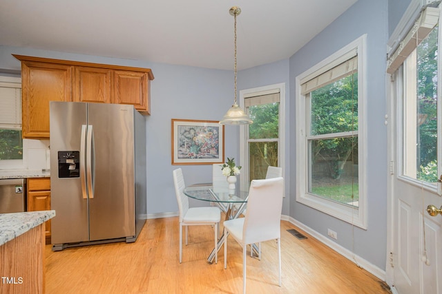 302 Caraway Ln, Cary, NC 27519 - dining area featuring light wood-type flooring