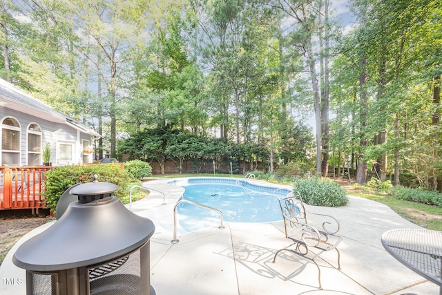 302 Caraway Ln, Cary, NC 27519 - view of pool with a patio area, a fenced backyard, and view of scattered trees