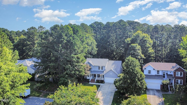 302 Caraway Ln, Cary, NC 27519 - drone / aerial view of a heavily wooded area
