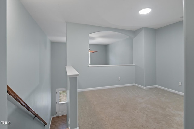 145 Mariah Towns Way, Garner, NC 27529 - empty room featuring carpet flooring and arched walkways