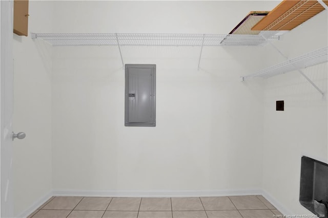 612 Marshtree Ln Unit 304, Fayetteville, NC 28314 - laundry room with electric panel and light tile patterned floors