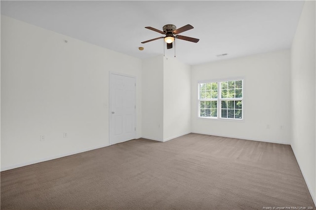 612 Marshtree Ln Unit 304, Fayetteville, NC 28314 - carpeted empty room featuring ceiling fan and baseboards