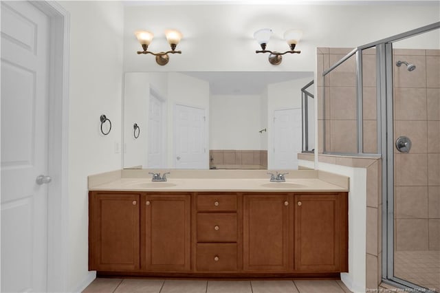 612 Marshtree Ln Unit 304, Fayetteville, NC 28314 - full bath with a shower stall, double vanity, and tile patterned floors