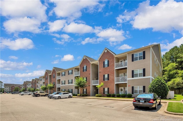 612 Marshtree Ln Unit 304, Fayetteville, NC 28314 - view of property featuring uncovered parking