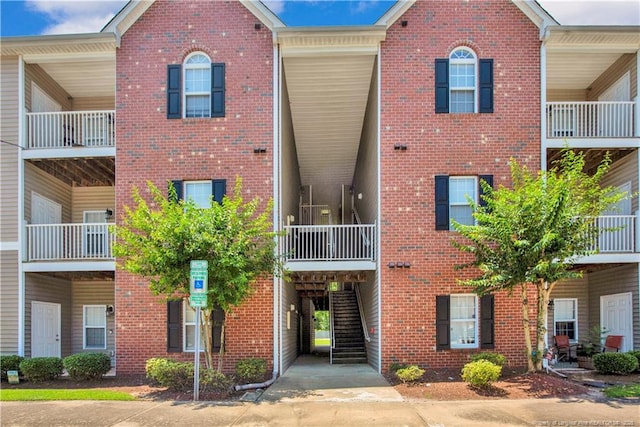 612 Marshtree Ln Unit 304, Fayetteville, NC 28314 - view of building exterior featuring stairway