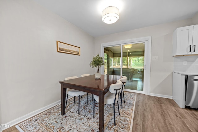 5721 Meadow Run, Knightdale, NC 27545 - dining space with light wood-style flooring