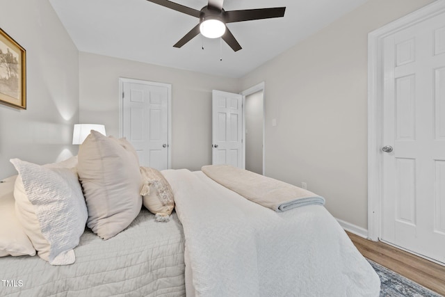 5721 Meadow Run, Knightdale, NC 27545 - bedroom featuring wood finished floors and ceiling fan