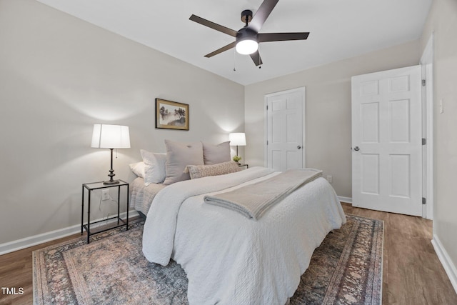 5721 Meadow Run, Knightdale, NC 27545 - bedroom with wood finished floors and ceiling fan