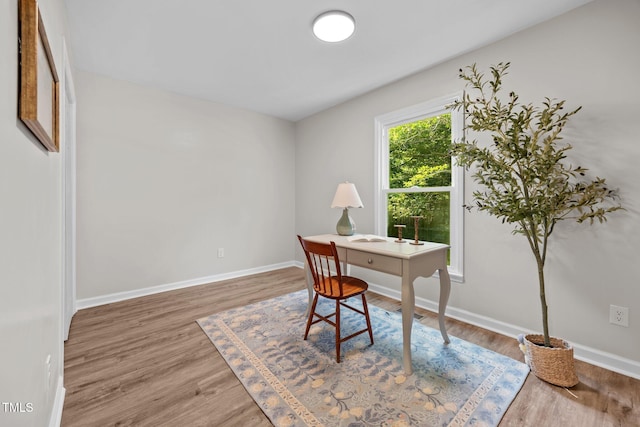 5721 Meadow Run, Knightdale, NC 27545 - office area featuring wood finished floors and baseboards
