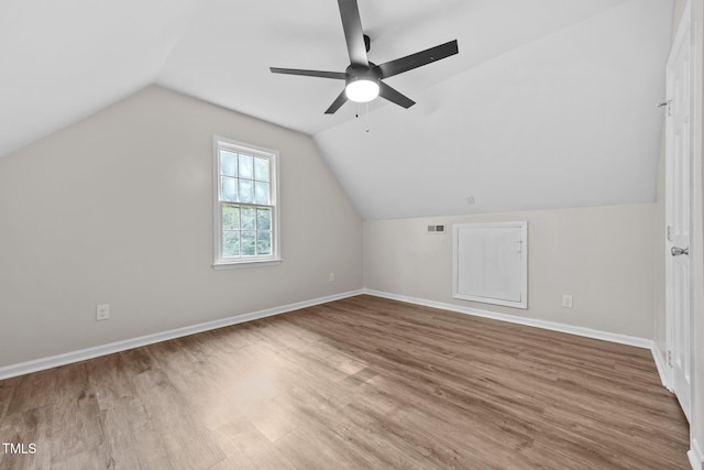 5721 Meadow Run, Knightdale, NC 27545 - additional living space with ceiling fan, wood finished floors, and lofted ceiling